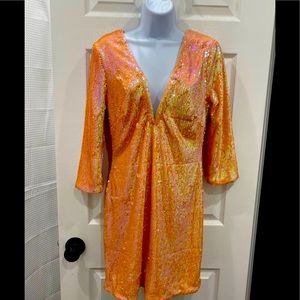 Beautiful sequin dress in iridescent pink.